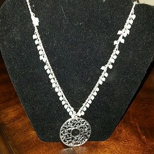 silver medallion with pearls and turquoise beads